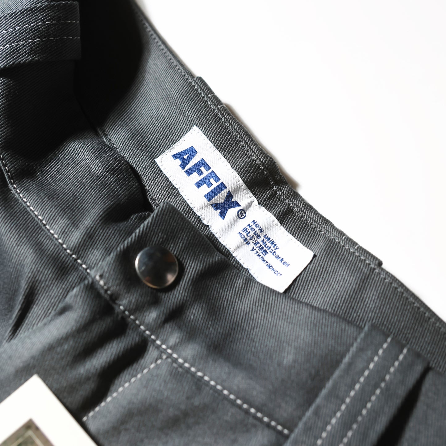 AFFIX TWILL TROUSER GREY