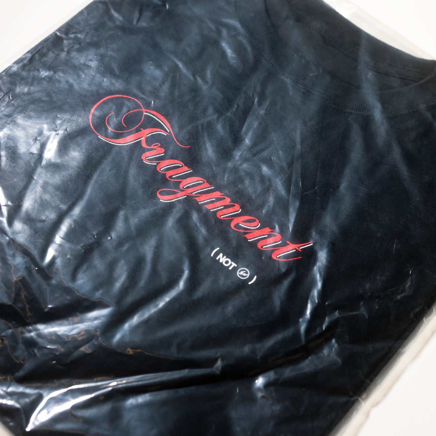 SACAI x FRAGMENT 'NOT FRAMENT' T-SHIRTS
